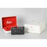 A Leica M6 Rangefinder Body, black, serial no. 2063911, body, E, shutter working, with documents and