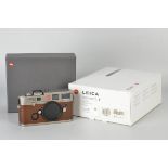 A Leica M6 TTL Titanium Rangefinder Camera, brown calf skin, serial no. 2754612, body, E, shutter