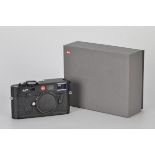 A Leica M7 Rangefinder Body, black, serial no. 2852092, body, VG-E, shutter not tested, in maker’s