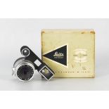 A Leitz Summaron f/2.8 35mm Lens, with eyes, chrome, serial no. 1695298, body, E, elements, E,