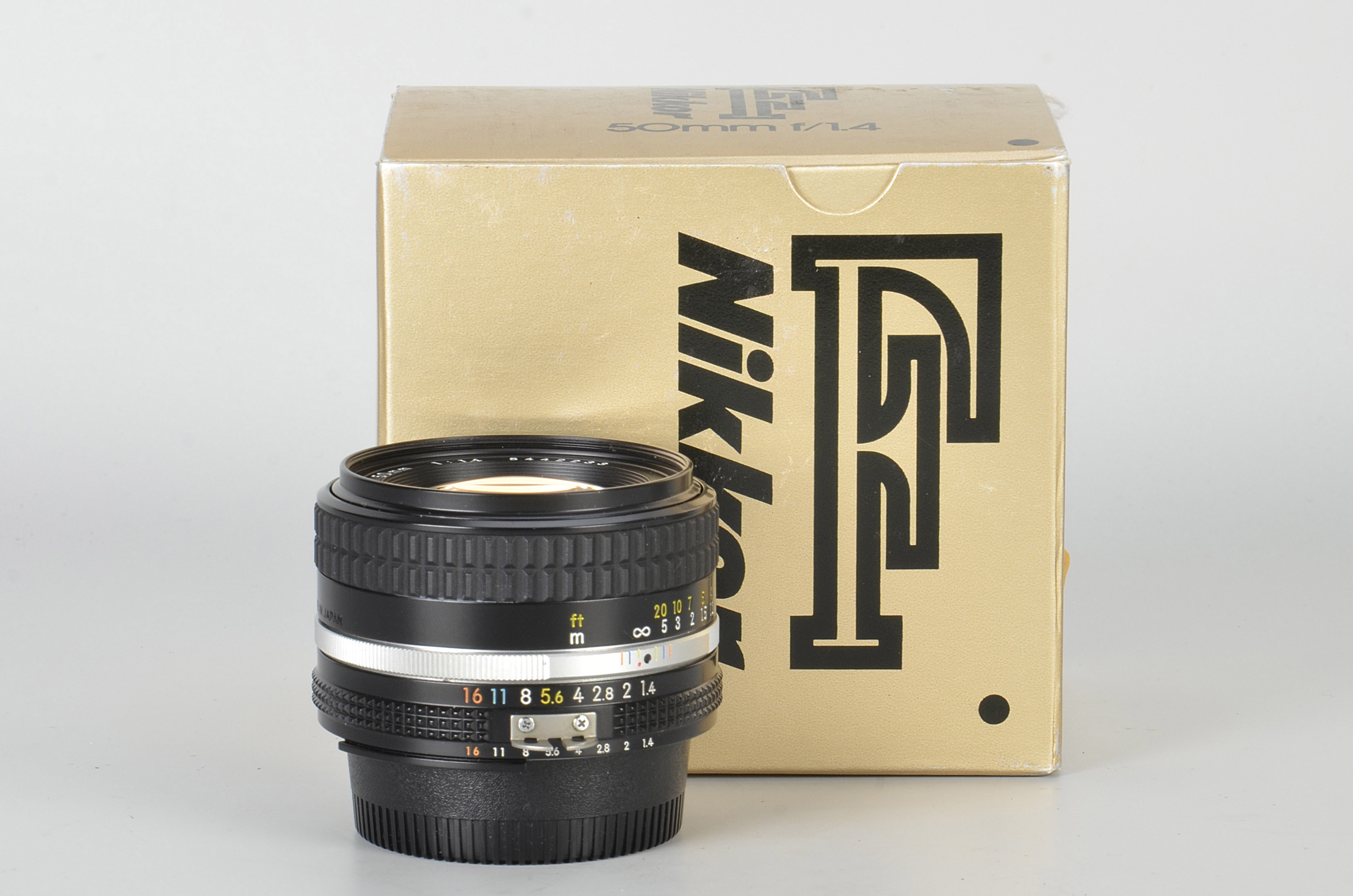 A Nikon AIS f/1.4 50mm Lens, black, serial no. 5442233, body, E, elements, VG-E, some very light