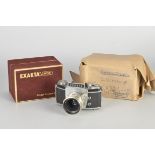 An Ihagee Exakta Varex IIA Dummy Model, chrome, serial no. A099, with Jena f/2.8 50mm lens,