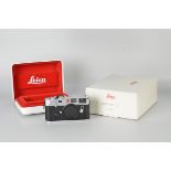 A Leica M6 Rangefinder Body, chrome, serial no. 1930251, body, E, shutter working, with documents