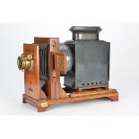 A British-made Coronet Horizontal Enlarger, with unmarked brass lens, body, VG, converted to