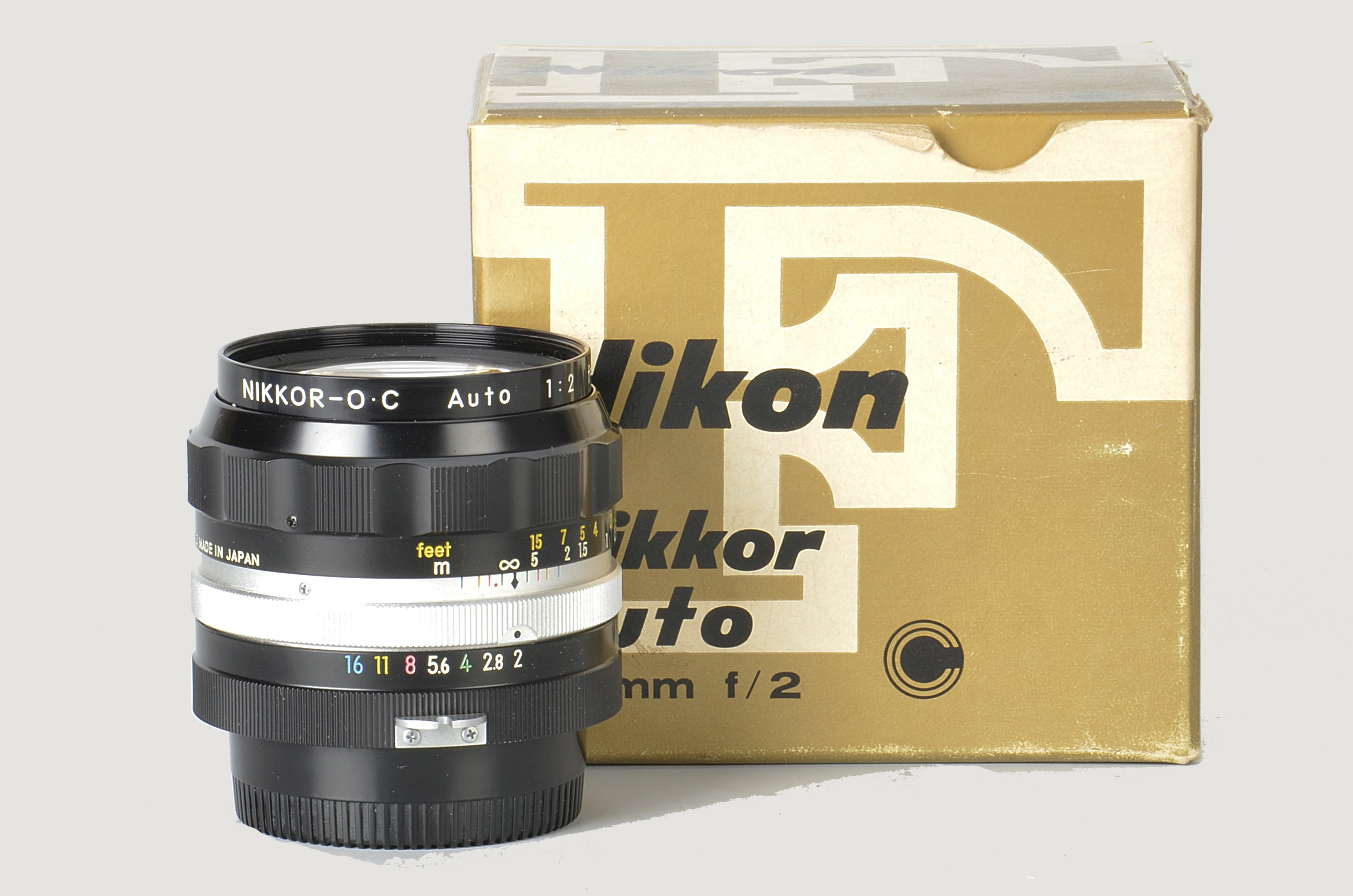 A Nikon Nikkor-O.C f/2 35mm Lens, black, serial no. 842356, body, E, elements, VG-E, in maker’s box