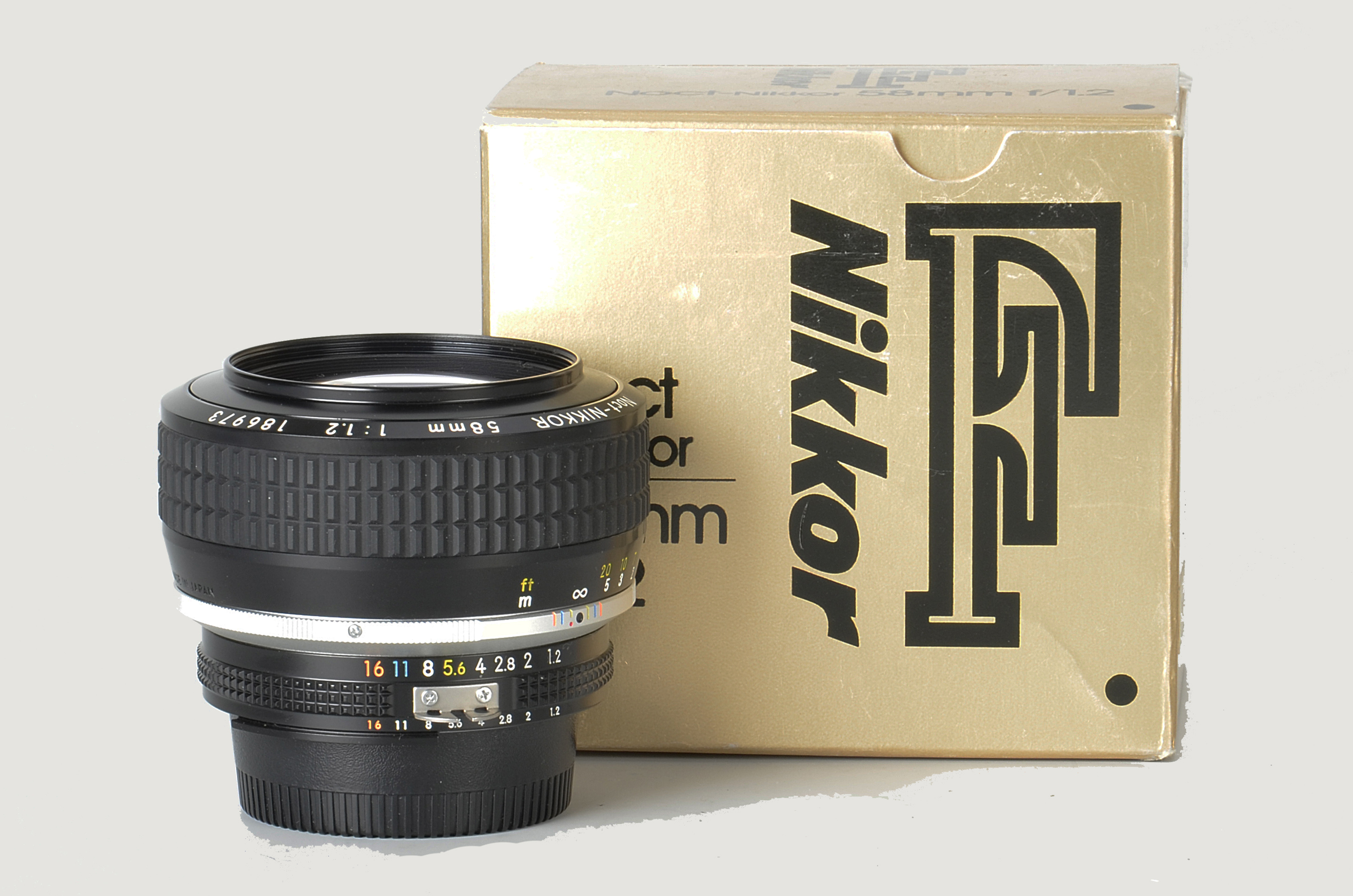 A Nikon Noct-Nikkor f/1.2 58mm Lens, black, serial no. 186973, body, E, elements, E, in maker’s box