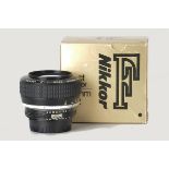 A Nikon Noct-Nikkor f/1.2 58mm Lens, black, serial no. 186973, body, E, elements, E, in maker’s box