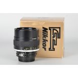 A Nikon AIS f/1.8 105mm Lens, black, serial no. 220358, body, E, elements, VG-E, in maker’s box