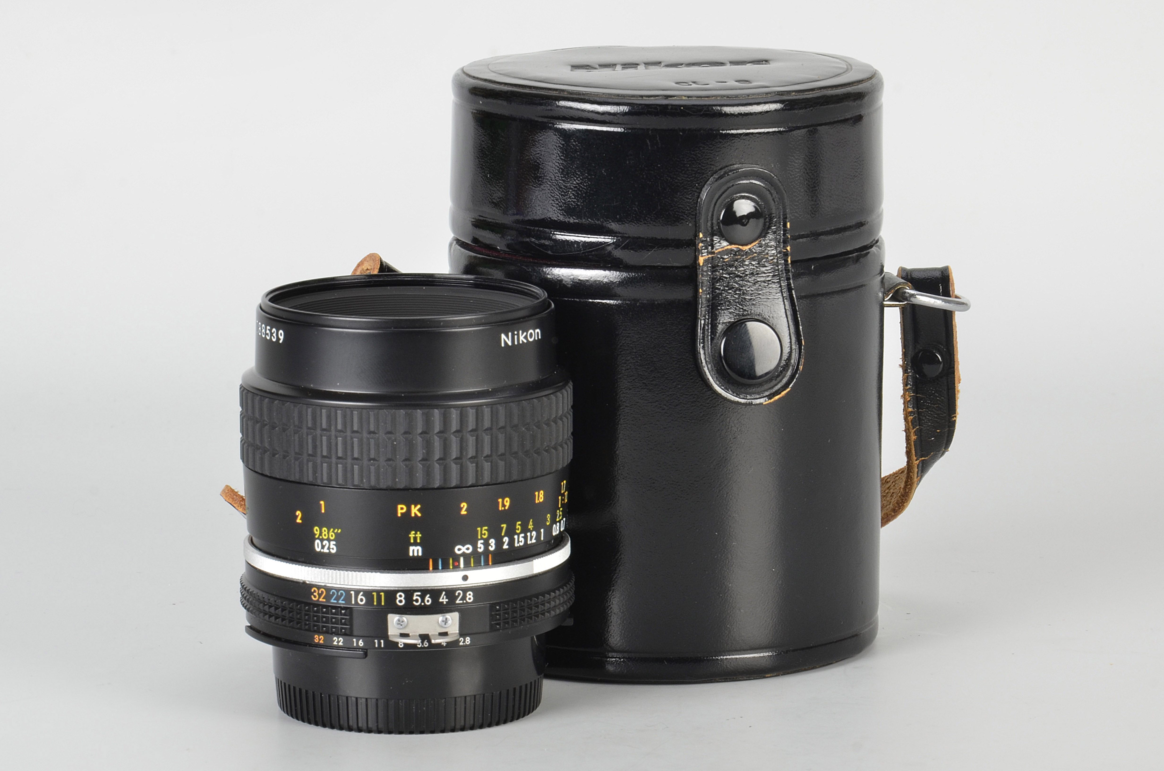 A Nikon AIS Micro-Nikkor f/2.8 55mm Lens, black, serial no. 188539, body, E, elements, VG-E, in