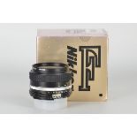 A Nikon AIS f/1.4 50mm Lens, black, serial no. 5762014, body, E, elements, VG-E, in maker’s box