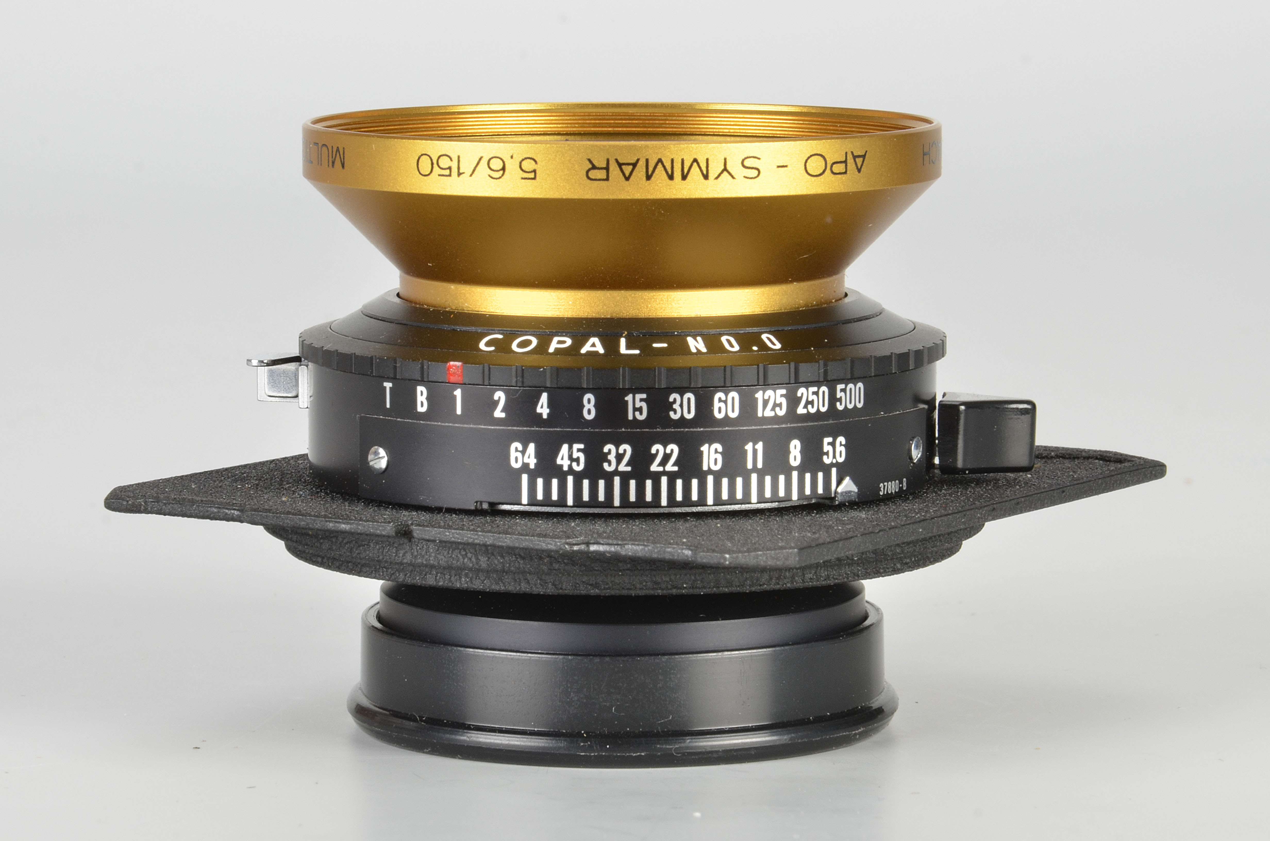 A Prototype Schneider APO-Symmar f/5.6 150mm Lens, gold, serial no. GE004, in Copal-No.0 shutter,