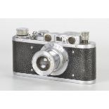 A FED Type 1A Rangefinder Camera, galvanized finish, serial no. 5545, with RED f/3.5 50mm lens,