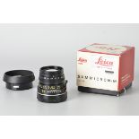 A Leitz Summicron-M f/2 50mm Lens, 1913-1983 edition, black, serial no. 3262738, body, E,