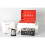 A Leica M6 Titanium Rangefinder Camera, serial no. 2168006, with Leitz Summicron-M f/2 50mm lens,