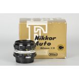 A Nikon Nikkor-H.C. f/2 50mm Lens, black, serial no. 2173096, body, E, elements, E, in maker’s box