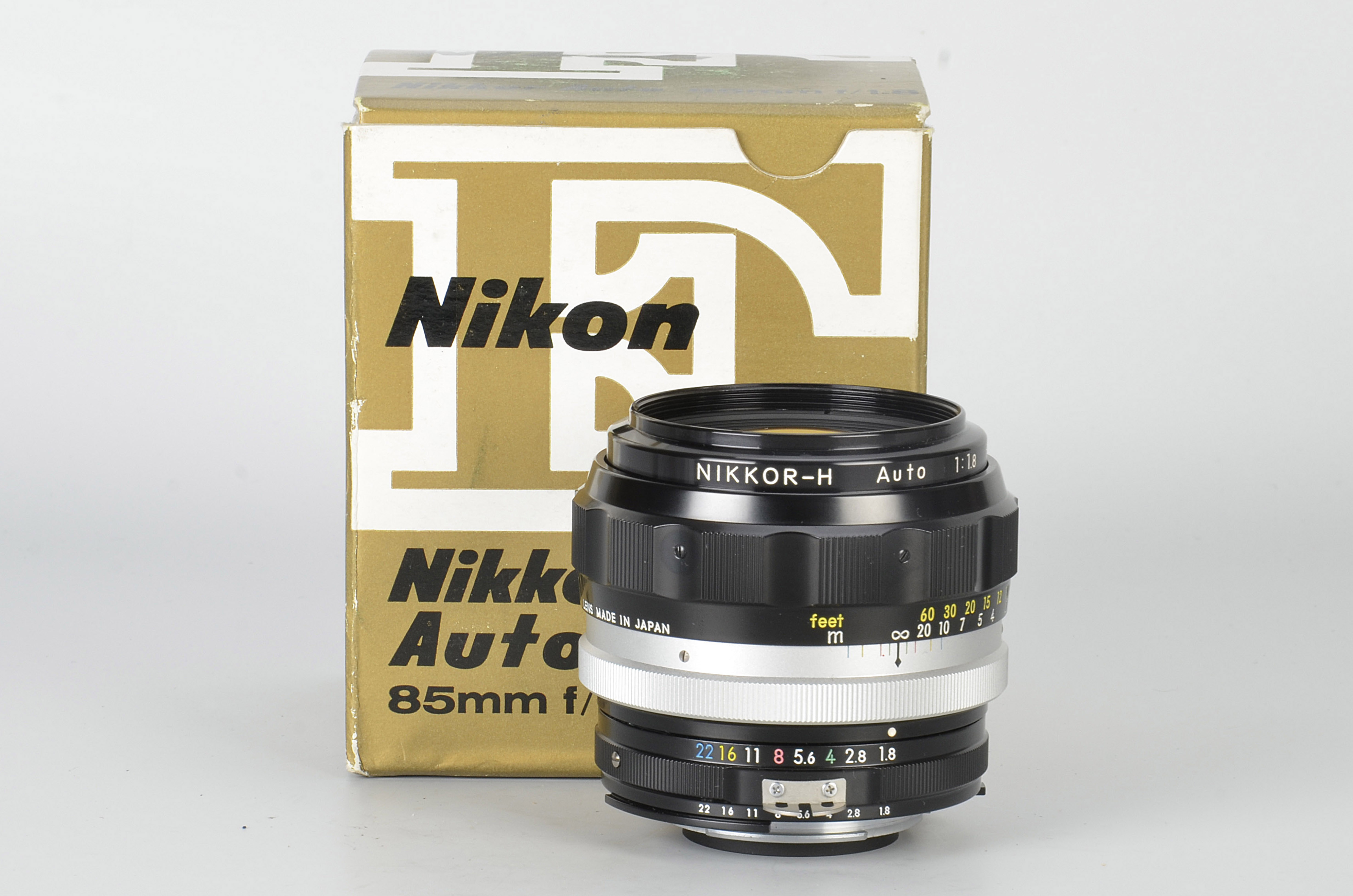 A Nikon Nikkor-H f/1.8 85mm Lens, black, serial no. 269102, body, E, elements, VG-E, in maker’s