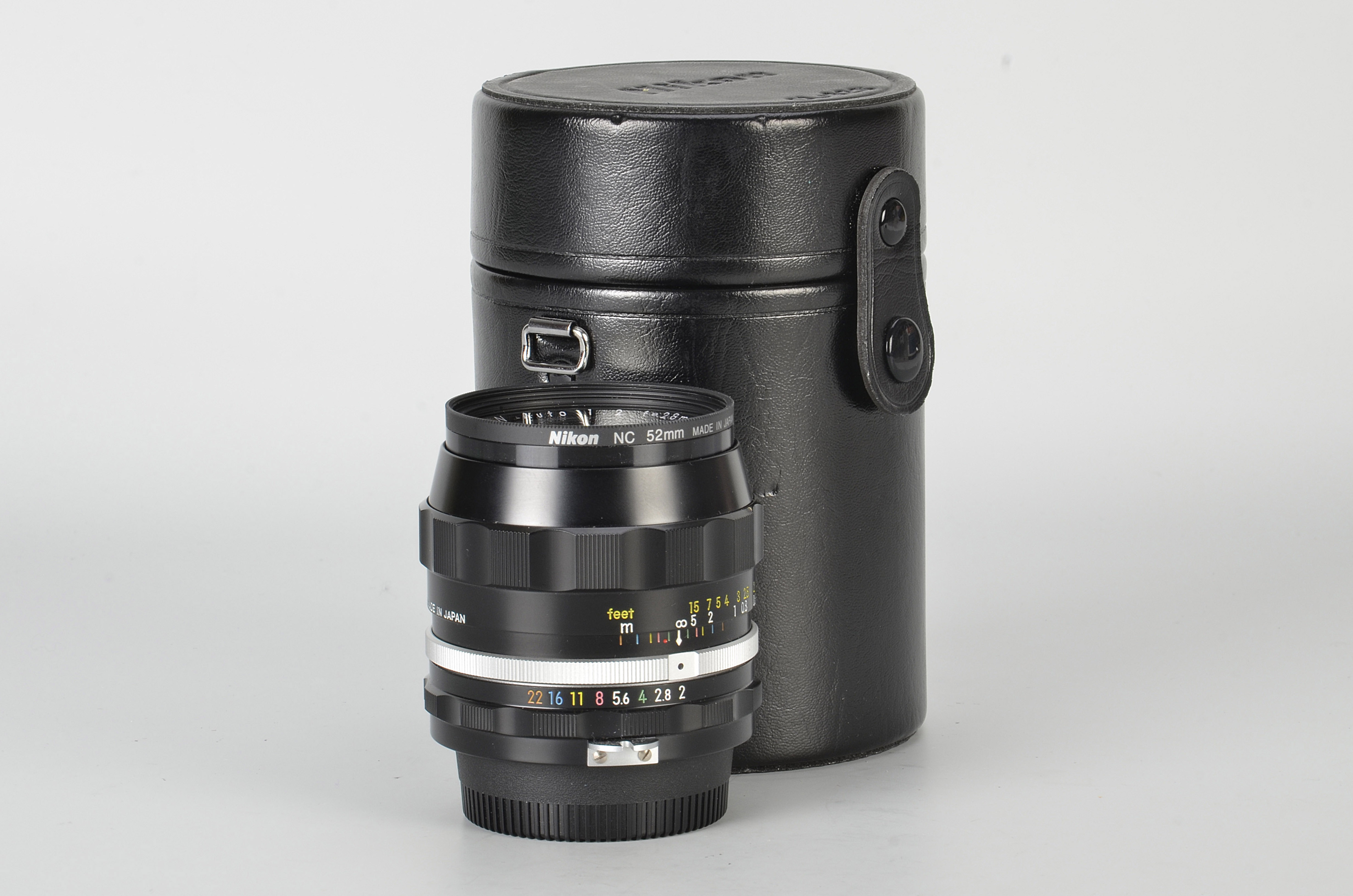 A Nikon Nikkor-N f/2 28mm Lens, black, serial no. 294650, body, E, elements, VG-E, in maker’s case