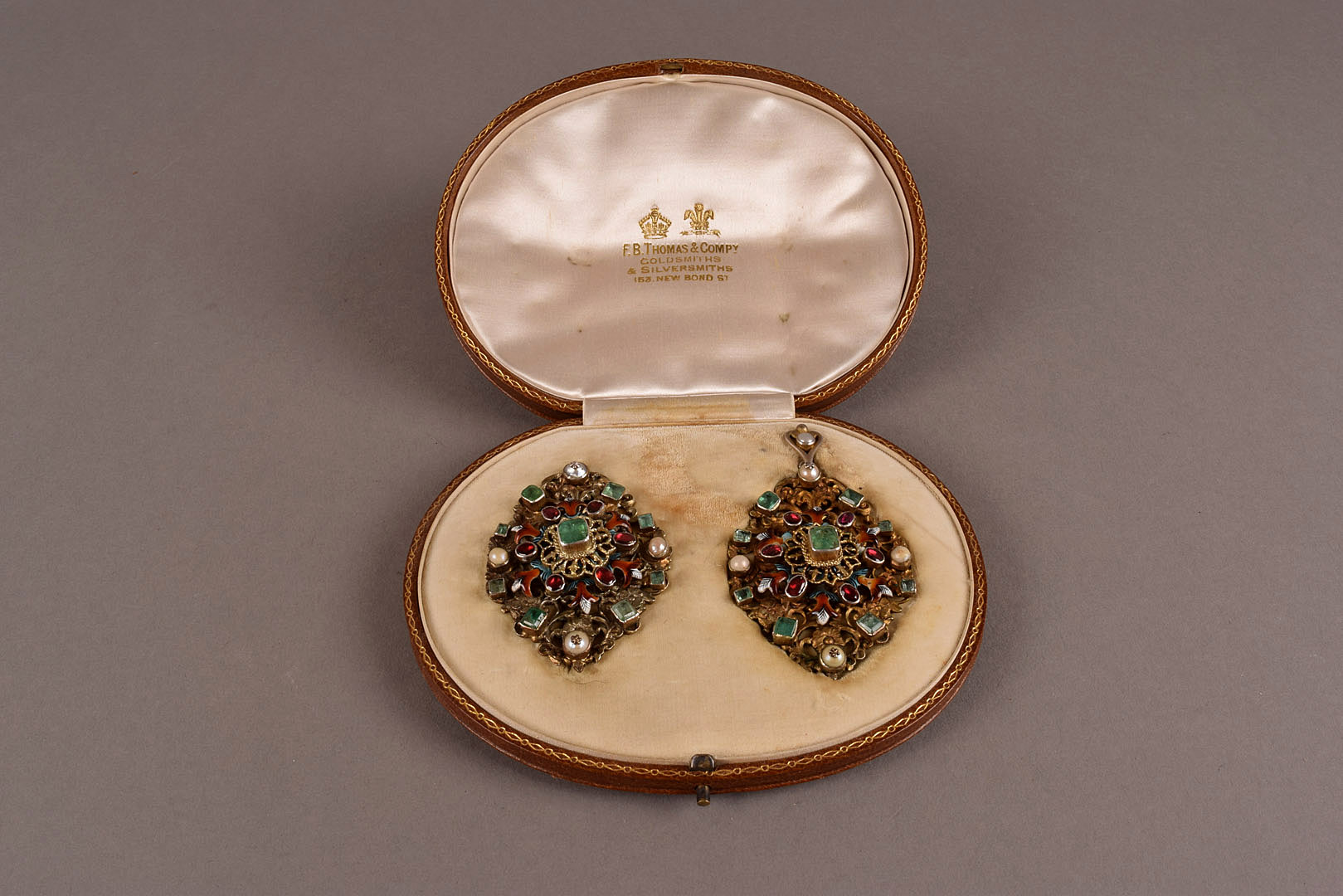 A fine Edwardian period Austro-Hungarian silver gilt enamelled and gem set pendant and brooch suite,