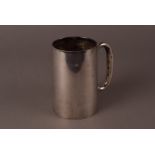 A George V silver tankard by J.G. Ltd, with plain tapering body, Birmingham 1932, approx. 11ozt.