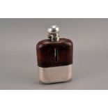 A large vintage hip flask by James Dixon & Sons, the oversized glass bottle with silver plated slide