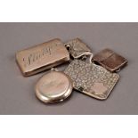 A group of five silver stamp holders, including one with double sprung stamp compartments, an