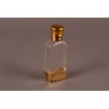 A fine Victorian silver and glass scent bottle cum vinaigrette by S. Mordan & Co, the rectangular