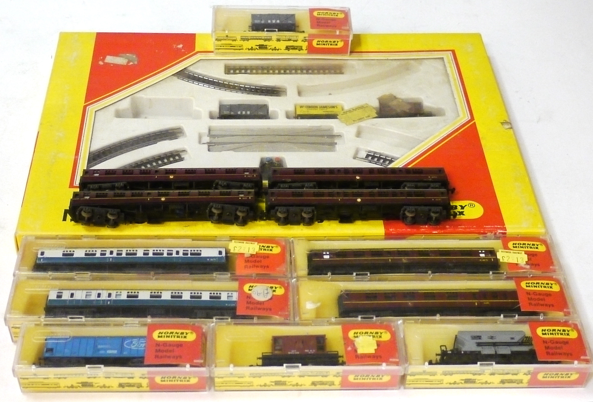 N Gauge Rolling Stock and Track by Trix, including part set with track parts and three wagons (
