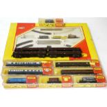 N Gauge Rolling Stock and Track by Trix, including part set with track parts and three wagons (