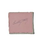 Buddy Holly, an autograph album book cover signed in blue pen 'Buddy Holly' with venue and date