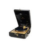 Portable gramophone: a Decca Model 10 in black ostrich-skin grained case with rounded ends and (