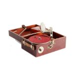 Portable gramophone: A Thorens 'Graphonette' in wood case with detachable tone-arm and 5-inch