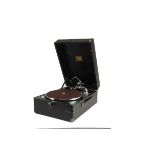 Portable gramophone: an HMV 102H, with 5b soundbox, in black case, 1954; and a quantity of records