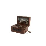 Portable gramophone: a mahogany portable of Carry Dot / Sternogram pattern (no soundbox)
