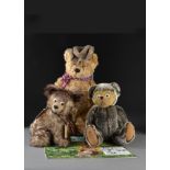 A Robin Reeve Theodore teddy bear, 24 of 300-15in. (38cm.) high; a Teddy’s Cub, 8 of 500; a