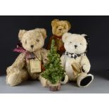 Three Hermann Limited Edition teddy bears: a white bear with black and white ruff; one with red