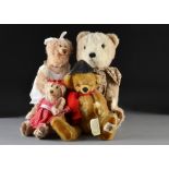 Four Nisbet teddy bears: Sir Freddie Farthing Bear - 14in. (351?2cm.) high; an alpaca Jack’s Bear; a