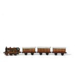 Bing 00 Gauge Clockwork Table Top LMS Locomotive and Coaches, maroon 2-4-0 Tank with Crests on sides