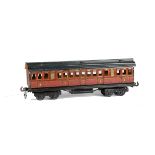 A Carette for Bassett-Lowke 0 Gauge Midland Railway Coach, of the ‘short-bogie’ series in crimson