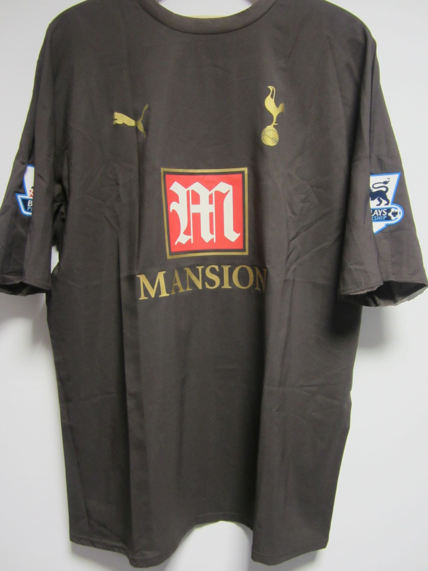 brown tottenham shirt