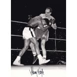 HENRY COOPER Black and white signed photo 12"x9" of Henry Cooper in action against Muhammad Ali.