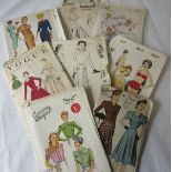 DRESS MAKING / KNITTING / NEEDLE WORK Over 125 dress making patterns in their original envelopes,