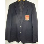 ARSENAL A men's navy blue jacket from Dunn & Co. with the red pre-2002 club badge embroidered with a