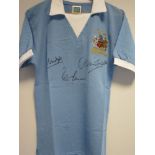 MANCHESTER CITY A replica shirt as worn by Manchester City in the 1976 League Cup Final, signed