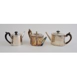 THREE GEORGE III SILVER TEAPOTS Comprising one of cylindrical form with removable lid and Greek fret
