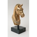 BRASS HOLLOW CAST HEAD OF A HORSE, AFTER THE ANTIQUE Facing forward, with cropped mane and oval