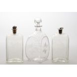 PAIR OF GERMAN ETCHED GLASS DECANTERS With later stoppers; etched with a crown above C X V, and
