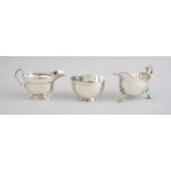 TWO ENGLISH SILVER SAUCE BOATS AND A FOOTED BOWL Comprising a bowl, marked 'HV' over 'AV', London,