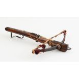 BONE-INLAID WALNUT CROSSBOW Probably South German, the stock with star inlaid at one side, mounted