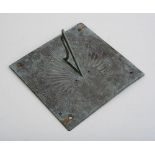 ENGLISH BRONZE SUNDIAL The plate engraved with a sun face and John Bryant, York" and "1709",