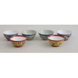 THREE PAIRS OF RUSSIAN PORCELAIN BOWLS Two with iron red Gardner mark, and Farsi characters, two
